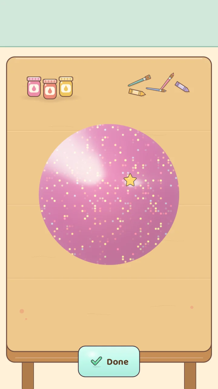 A glossy pink glitter slime on the play table